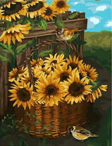 Воробьи возле корзины с подсолнухами