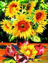 Букет подсолнухов и гранат