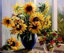 Вазы с подсолнухами и рябиной на подоконнике